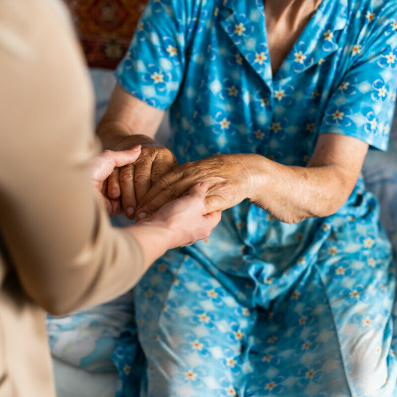 Senior woman with her home caregiver